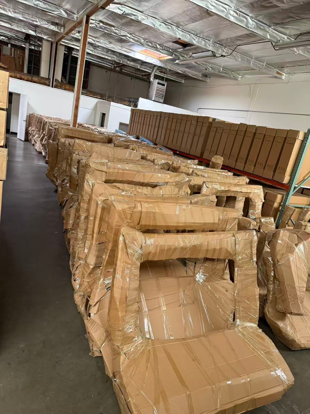 Wrapped Tesla door shells in warehouse